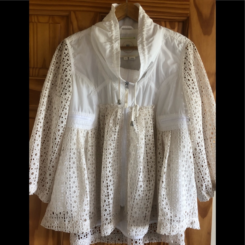 Ivory parka with embroidered lacing